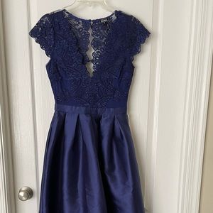 Navy blue ball gown. Lace too, sheen bottom. Floor length. Gorgeous, great fit.